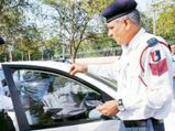 Traffic Police Remove Tinted Glasses For Free