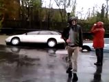A Road Swallows Several Cars