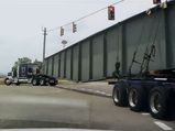Semi Truck Carrying Huge Steel Beam Tips Over