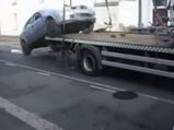 Man Jumps Car Off Flatbed To Avoid Towing Charges
