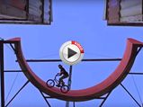Cyclist Makes Container Storage Yard His Playground 