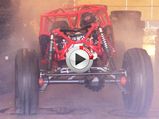 Video: Chained Up Rock Bouncer Does An Angry Burnout - Smokes Its Tyres 