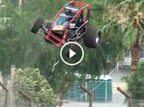 Video: Racing Car Jumps Over 22-Foot Fence 