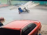 Video: Scooter Rider Proves Why It's Not Safe To Ride During A Typhoon
