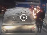 Flaming Idiot — Woman Ignites Car's Frozen Fuel Cap At Petrol Pump