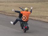 Look Ma, No Hands! Mad Cap Stunt Rider Pulls Off Longest Free-Hand Wheelie On A Vespa