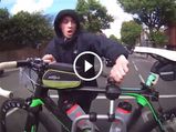 Thief Tries To Steal A Bicycle From A Moving Car