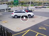 Woman Jumps On Top Of Her Car To Stop Carjackers