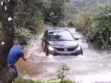 Tata Hexa Demonstrates Extreme Off-Roading Capabilities; Crosses A River In Heavy Rain