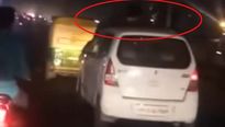 Road Rage In India: Video Of A Man On Top Of A Running Car Becomes Viral!