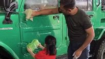 MS Dhoni’s Daughter Ziva Lends A Helping Hand In Washing Nissan Jonga