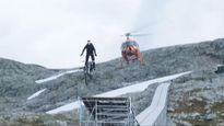 Death-Defying Tom Cruise Jumps Bike Off A Cliff - Biggest Movie Stunt Scene Ever  