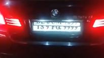 BMW With James Bond Style ‘Flipping’ Number Plates Caught In Hyderabad – Police Shocked!