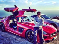 Lewis Hamilton Poses With His Mercedes-Benz Sports Cars