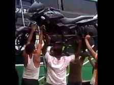 Indian Superman Carries Pulsar Over His Head