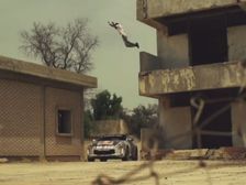 Rally Car Versus Free Runner In Kuwait
