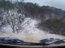 Driver Takes His Car Skiing