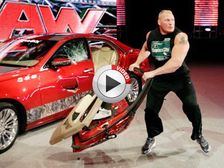 WWE’s Brock Lesnar Destroys Cadillac & Throws Door At Fan