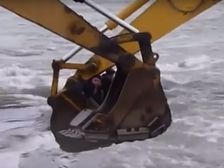 River Crossing Made Interesting By Two Excavators