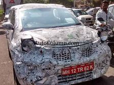 Tata Nexon SUV Spied Testing In Full Camouflage - Pictures
