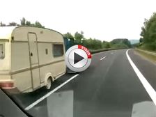 Mental Tractor Speeds Past Car On Autobahn - Video
