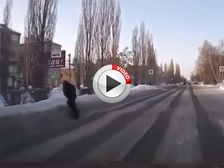 Drunk Russian Man Faceplants While Crossing Snowy Road - Video