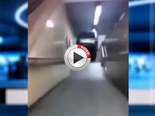 Hooligans Push A Car Down An Escalator At A Metro Station - Video