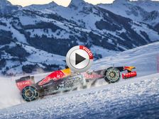 Max Verstappen Drives Red Bull RB7 Up A Snowy Mountain - Video