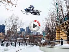 Snowmobile Rider Rips Through Snowed Out City - Video