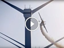 Red Bull Flies Stunt Plane Through Windmill Farm - Video