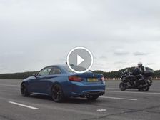 BMW M2 Races Two BMW Motorcycles — An Obvious Result?