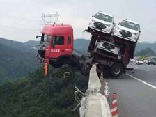 Hanging On For Dear Life — Truck Dangles Off A 500-Foot Tall Bridge