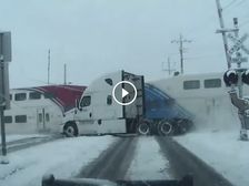 Video: Train Smashes Into FedEx Truck — On Time Delivery Chances Get Obliterated