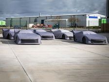 Pack Of Aston Martin Vulcans Awaiting Delivery Look Menacing Even With The Covers On