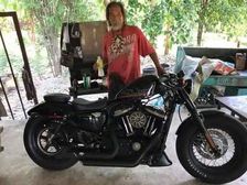 Shabbily Dressed Man Denied Attention At Dealerships; Buys A Harley With Ready Cash