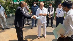 TVS Motor Company Hands Over 3000 PPEs & 10,000 N95 Masks To Karnataka Chief Minister