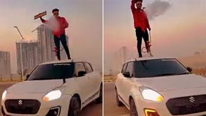 റീല്‍സിടാന്‍ എന്തും ചെയ്യും! വൈറലാകാന്‍ കാറിന് മുകളില്‍ ഹുക്ക വലിച്ച യുവാവ് 'എയറിലായി'