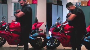 ഇങ്ങനെയും ഒരച്ഛന്‍; കുഞ്ഞിന്റെ കരച്ചില്‍ നിര്‍ത്താന്‍ കേള്‍പ്പിച്ചത് സൂപ്പര്‍ബൈക്കിന്റെ 'താരാട്ട്' 