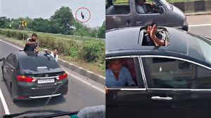 ഹോണ്ട സിറ്റിയുടെ സൺറൂഫിൽ കയറി നിന്ന് ലോറിക്ക് നേരെ കല്ലേറ്, വൈറൽ വീഡിയോ കാണാം