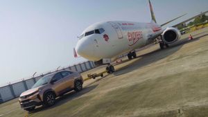 നിന്നെ കൊണ്ട് ഇതൊക്കെ എങ്ങനെ സാധിക്കുന്നെടാ; ബോയിങ്ങ് 737 കെട്ടിവലിച്ച് ടാറ്റയുടെ കൂപ്പെ എസ്‌യുവി