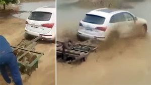 ரூ. 50 லட்சம் மதிப்புள்ள ஆடி காரை டிராக்டராக மாற்றிய விவசாயி... வீடியோ...!