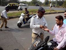 Royal Enfield Rider Fined For Not Wearing Seatbelt