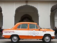 పెంగ్విన్ మస్కట్‌గా హిందుస్థాన్ మోటార్స్ అంబాసిడర్