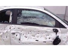 కొత్త కారు స్టార్ట్ అవ్వలేదని గొడ్డలితో నరికేశాడు!