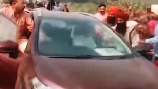 उत्तरप्रदेश बीजेपी नेता ट्रैफिक हटाने लहरायी बंदूक लोगों ने पीटकर किया बुरा हाल