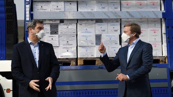 बीएमडब्ल्यू कर्मचारियों के लिए बना रही है फेस मास्क