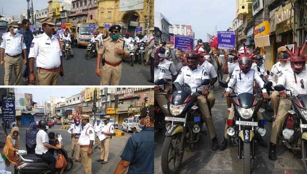 कोरोना वायरस से बचाव के लिए हैदराबाद ट्रैफिक पुलिस ने निकाली रैली, पहने कोरोना हेलमेट