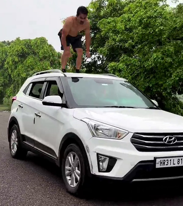 Man Does Push-ups On Moving Hyundai Creta Top
