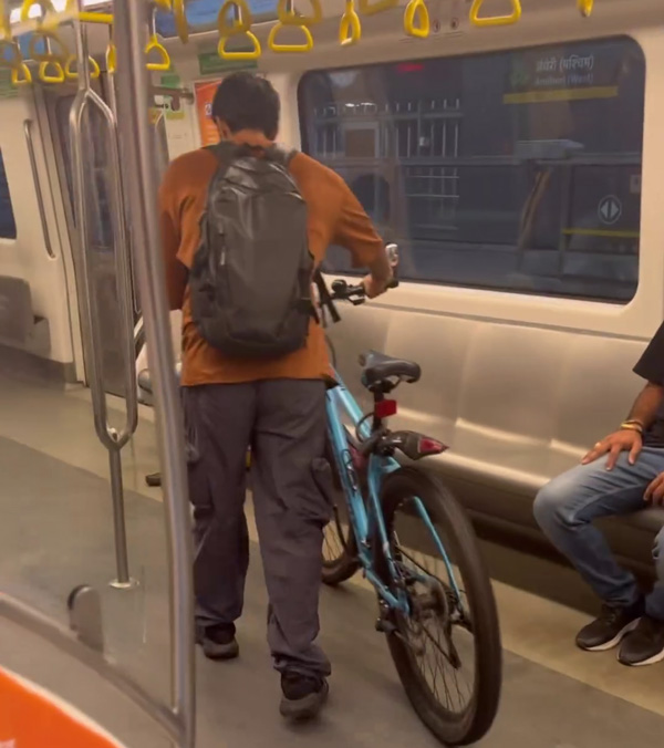 Man Rides Mumbai Metro With His cycle Man Rides Mumbai Metro With His cycle