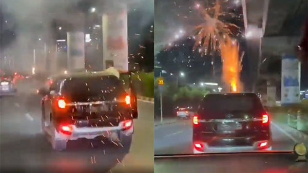 Persons Bursting Crackers From Their Car Persons Bursting Crackers From Their Car